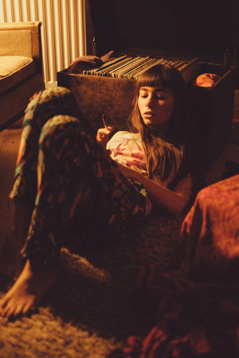 candid girl writing music