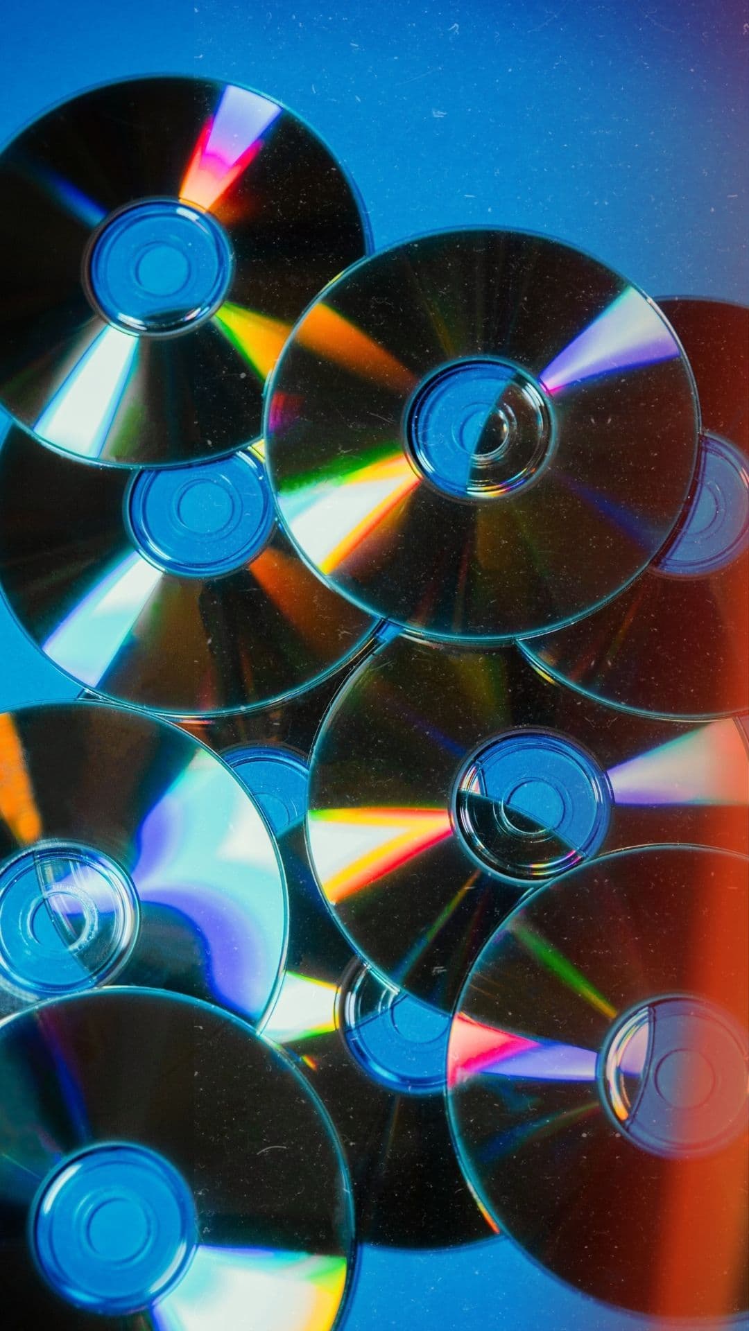 cd lot on blue background