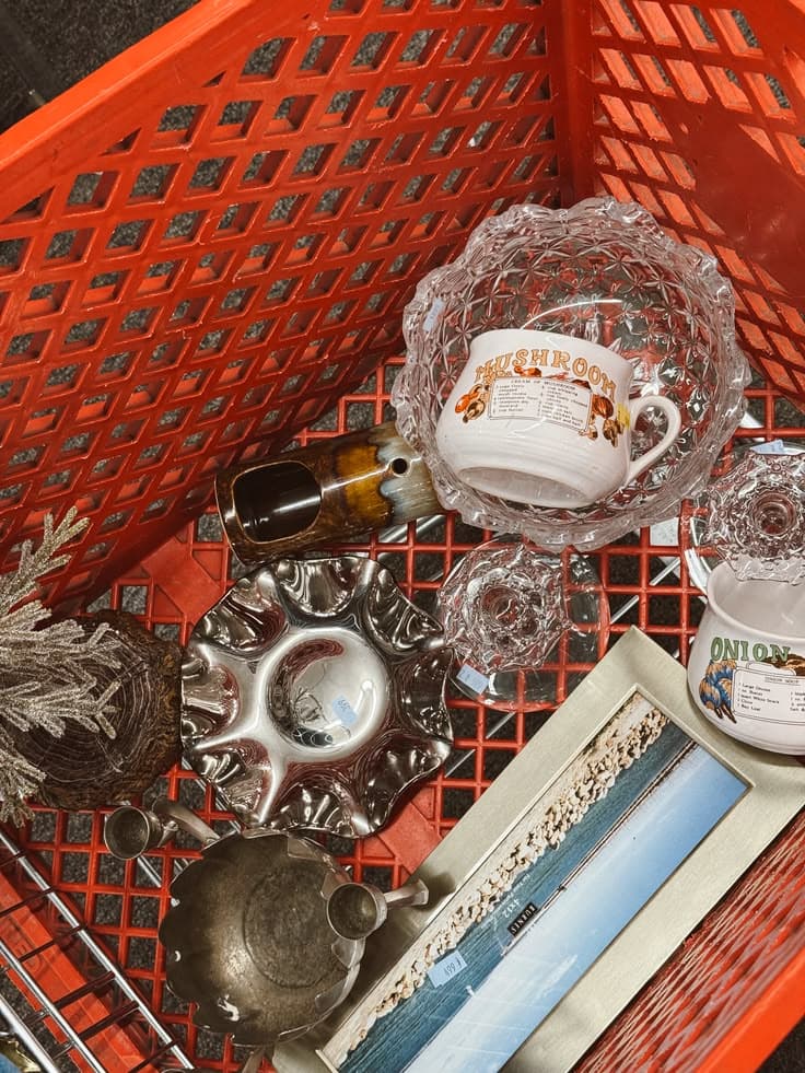 red grocery cart at a thriftstore